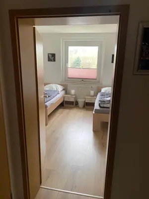 Ein Bett oder Betten in einem Zimmer der Unterkunft FeWo WIEKO Plauen Leibnizstr. H3, 2. OG rechts