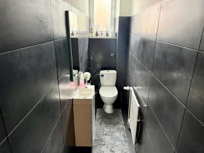 Ein Badezimmer in der Unterkunft Stylisches City Apartment-Balkon-24h CheckIn-SmartTV