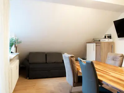 Ein Sitzbereich in der Unterkunft Ferienwohnung Prof. Dehmer