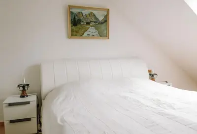 Ein Bett oder Betten in einem Zimmer der Unterkunft Ferienwohnung Prof. Dehmer