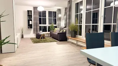 Ein Sitzbereich in der Unterkunft Exklusives Penthouse mit Dachterrasse, hochwertig ausgestatteter Küche mit Dampfgarer, inklusive 2 Stellplätze und Fahrradgarage