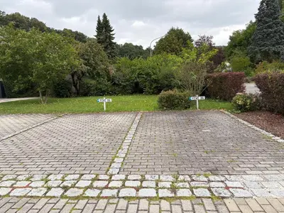 Ein Garten an der Unterkunft Exklusives Penthouse mit Dachterrasse, hochwertig ausgestatteter Küche mit Dampfgarer, inklusive 2 Stellplätze und Fahrradgarage