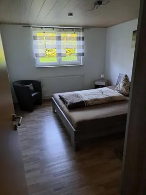 Ein Bett oder Betten in einem Zimmer der Unterkunft Familie Wiegärtner