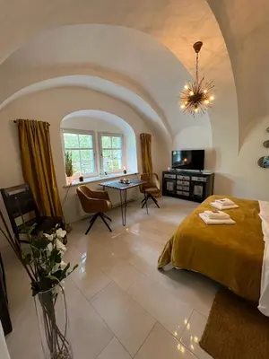 Ein Bett oder Betten in einem Zimmer der Unterkunft Gewölbe-Stübchen im Herrenhaus