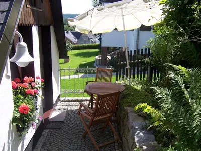 Ein Garten an der Unterkunft Ferienhäuschen Grenzland