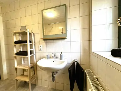 Ein Badezimmer in der Unterkunft 59m² Ferienwohnung 