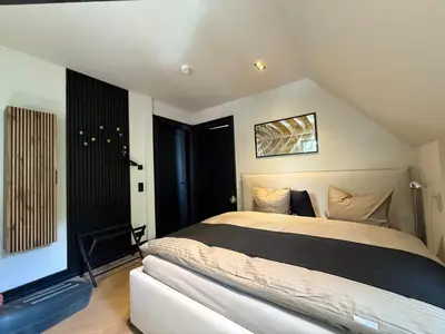 Ein Bett oder Betten in einem Zimmer der Unterkunft * Stadtvilla Plauen * * außergewöhnlich * 2 Zimmerwohnung * Zentrumsnah