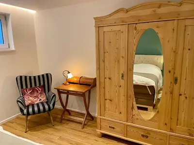 Ein Bett oder Betten in einem Zimmer der Unterkunft SONNENWEG Designwohnung mit Gartenblick