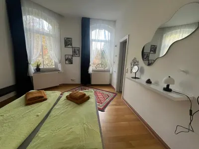 Ein Bett oder Betten in einem Zimmer der Unterkunft Ferienwohnung Marie