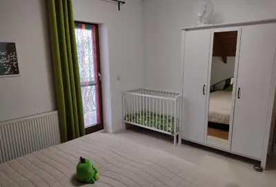 Ein Bett oder Betten in einem Zimmer der Unterkunft Gemütliche Ferienwohnung im schönen Erzgebirge - Wohnung Frühling