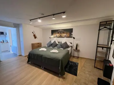 Ein Bett oder Betten in einem Zimmer der Unterkunft Apartment Violine1 am Bahnhof-City