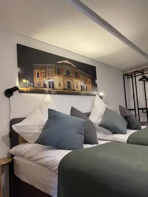 Ein Bett oder Betten in einem Zimmer der Unterkunft Apartment Violine1 am Bahnhof-City