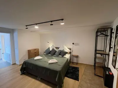 Ein Bett oder Betten in einem Zimmer der Unterkunft Apartment Violine1 am Bahnhof-City