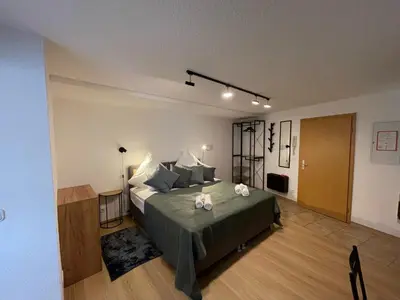 Ein Bett oder Betten in einem Zimmer der Unterkunft Apartment Violine1 am Bahnhof-City