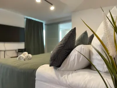 Ein Bett oder Betten in einem Zimmer der Unterkunft Apartment Violine1 am Bahnhof-City
