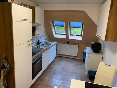 Küche/Küchenzeile in der Unterkunft FeWo WIEKO Plauen Leibnizstr. H3, DG links