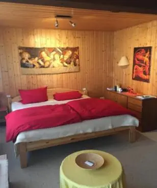 Ein Bett oder Betten in einem Zimmer der Unterkunft Ferienhaus Susanne