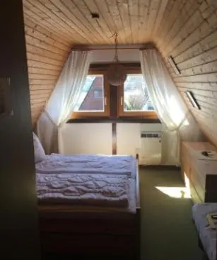 Ein Bett oder Betten in einem Zimmer der Unterkunft Ferienhaus Susanne