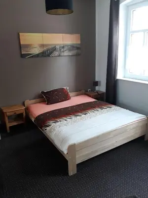 Ein Bett oder Betten in einem Zimmer der Unterkunft Allsaitig Klang- und Seminarzentrum Selb