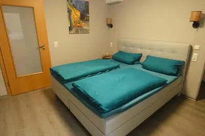 Ein Bett oder Betten in einem Zimmer der Unterkunft Paris