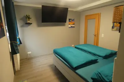 Ein Bett oder Betten in einem Zimmer der Unterkunft Paris