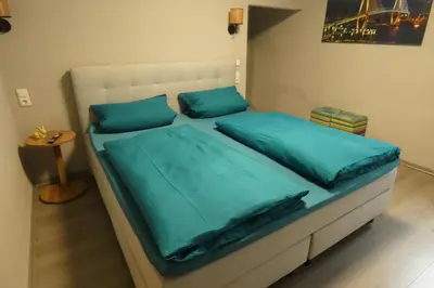 Ein Bett oder Betten in einem Zimmer der Unterkunft Paris