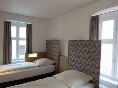 Ein Bett oder Betten in einem Zimmer der Unterkunft Hotel Kloster-Gasthof Speinshart