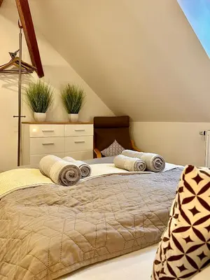 Ein Bett oder Betten in einem Zimmer der Unterkunft Ferienwohnung Missa