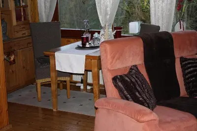Ein Sitzbereich in der Unterkunft Apartment am Buchenhain
