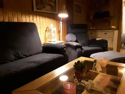 Ein Sitzbereich in der Unterkunft Apartment am Buchenhain