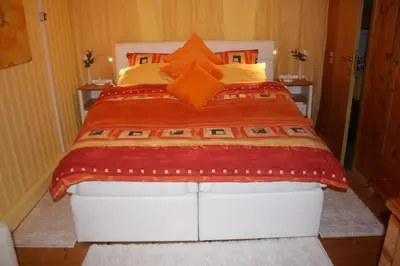 Ein Bett oder Betten in einem Zimmer der Unterkunft Apartment am Buchenhain