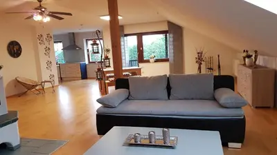 Ein Sitzbereich in der Unterkunft Ferienwohnung Obertshauser