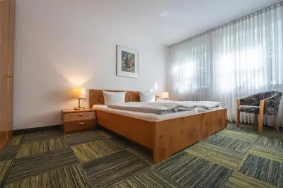 Ein Bett oder Betten in einem Zimmer der Unterkunft Gut Matheshof Apartments