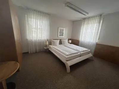 Ein Bett oder Betten in einem Zimmer der Unterkunft Gut Matheshof Apartments