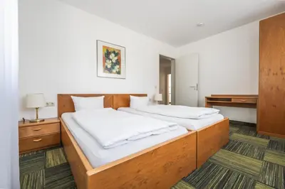 Ein Bett oder Betten in einem Zimmer der Unterkunft Gut Matheshof Apartments