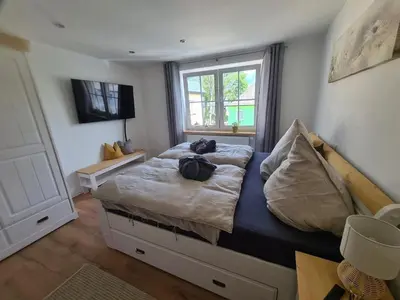 Ein Bett oder Betten in einem Zimmer der Unterkunft Waldstein Terrassen
