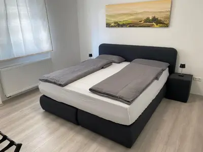 Ein Bett oder Betten in einem Zimmer der Unterkunft NES 1 - nähe Freiheitshalle Hof