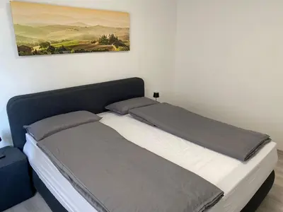 Ein Bett oder Betten in einem Zimmer der Unterkunft NES 1 - nähe Freiheitshalle Hof