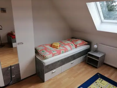 Ein Bett oder Betten in einem Zimmer der Unterkunft Ferienwohnung Fleischer