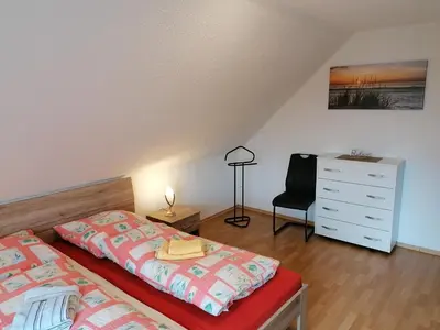 Ein Bett oder Betten in einem Zimmer der Unterkunft Ferienwohnung Fleischer
