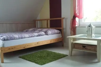 Ein Bett oder Betten in einem Zimmer der Unterkunft Ferienwohnung in Thurnau