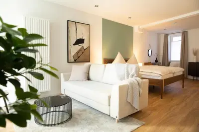 Ein Bett oder Betten in einem Zimmer der Unterkunft bayreuthome - Ambiente-Apartment im Gassenviertel