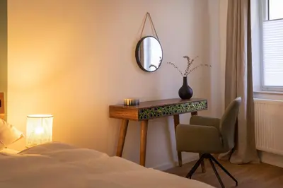 Ein Bett oder Betten in einem Zimmer der Unterkunft bayreuthome - Ambiente-Apartment im Gassenviertel
