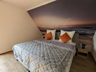 Ein Bett oder Betten in einem Zimmer der Unterkunft Nepalaya Ferienwohnung