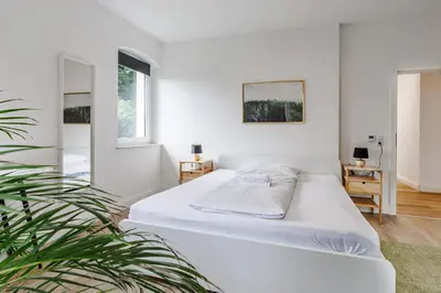 Ein Bett oder Betten in einem Zimmer der Unterkunft Villa Plassenburg