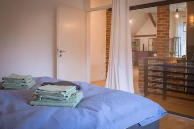 Ein Bett oder Betten in einem Zimmer der Unterkunft Scheunenloft mit Garten