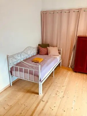 Ein Bett oder Betten in einem Zimmer der Unterkunft Scheunenloft mit Garten