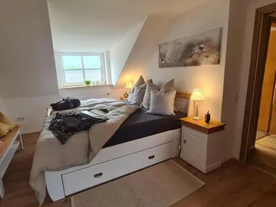 Ein Bett oder Betten in einem Zimmer der Unterkunft Waldstein Gipfelstürmer