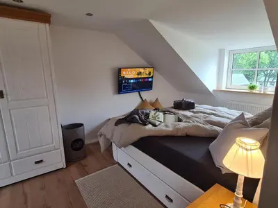 Ein Bett oder Betten in einem Zimmer der Unterkunft Waldstein Gipfelstürmer