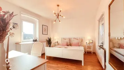 Ein Bett oder Betten in einem Zimmer der Unterkunft Zentrales Turm-Apt mit Terrasse